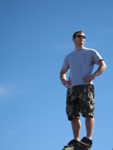 Man Standing on Pinnacle