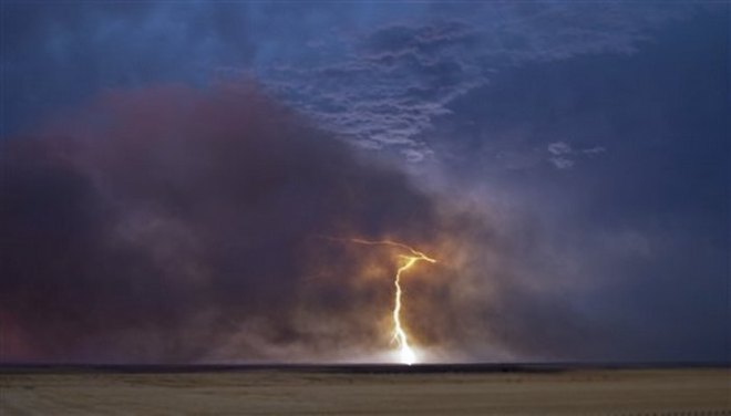 Lightning on Land Over Ocean - Copy