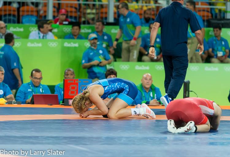 Joy and Sorrow on the Gold Medal Mat by Larry Slater
