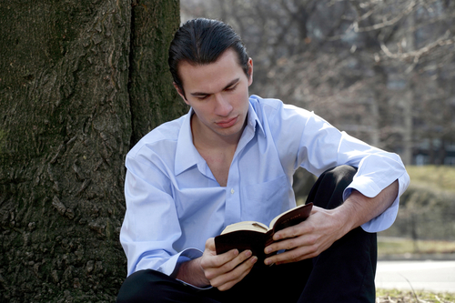 Male reading Bible